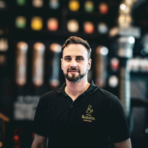 Carl the barista at Little Barista – serving speciality coffee with a smile
